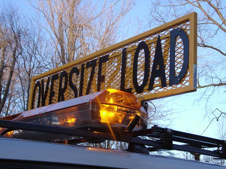 sign 5.JPG - OSL Mounted with Light Bar Adapter Option.  MX7000 PSE Light Bar.